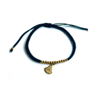 Pulsera adaptable de hilo azul marino con bolitas doradas y medallita de la Virgen del Rocío