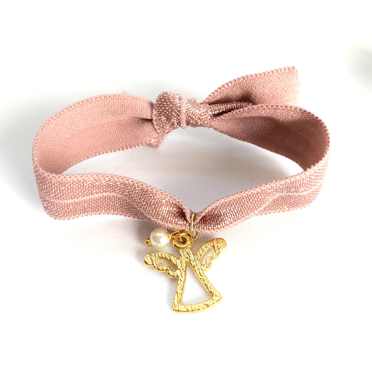 Pulsera elástica rosa con angelito chapado y perlita