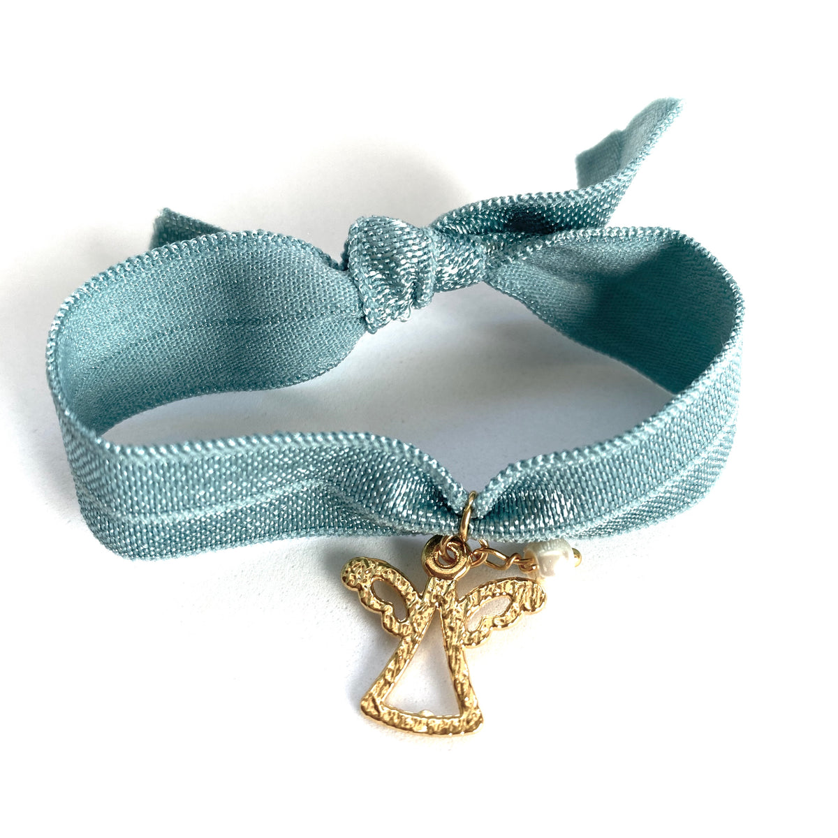 Pulsera elástica azul con angelito chapado