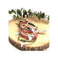 Pulseras elásticas de cordón en varios colores con cruz de nácar