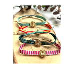 Pulseras de tela con medalla de acero de la Virgen Inmaculada en varios colores